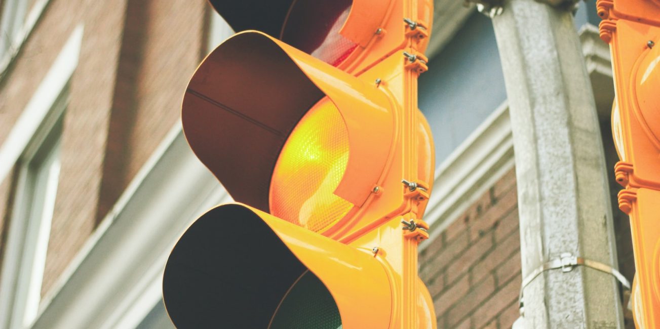 yellow painted traffic light