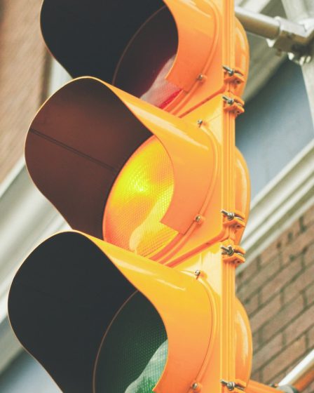 yellow painted traffic light