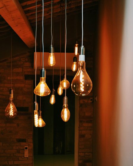 turned on orange pendant lamps